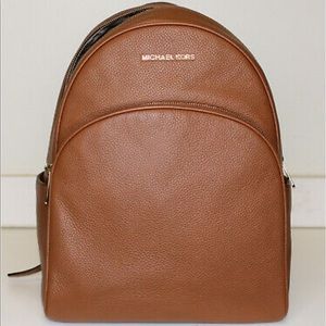 Michael Kors brown pebbled leather backpack.